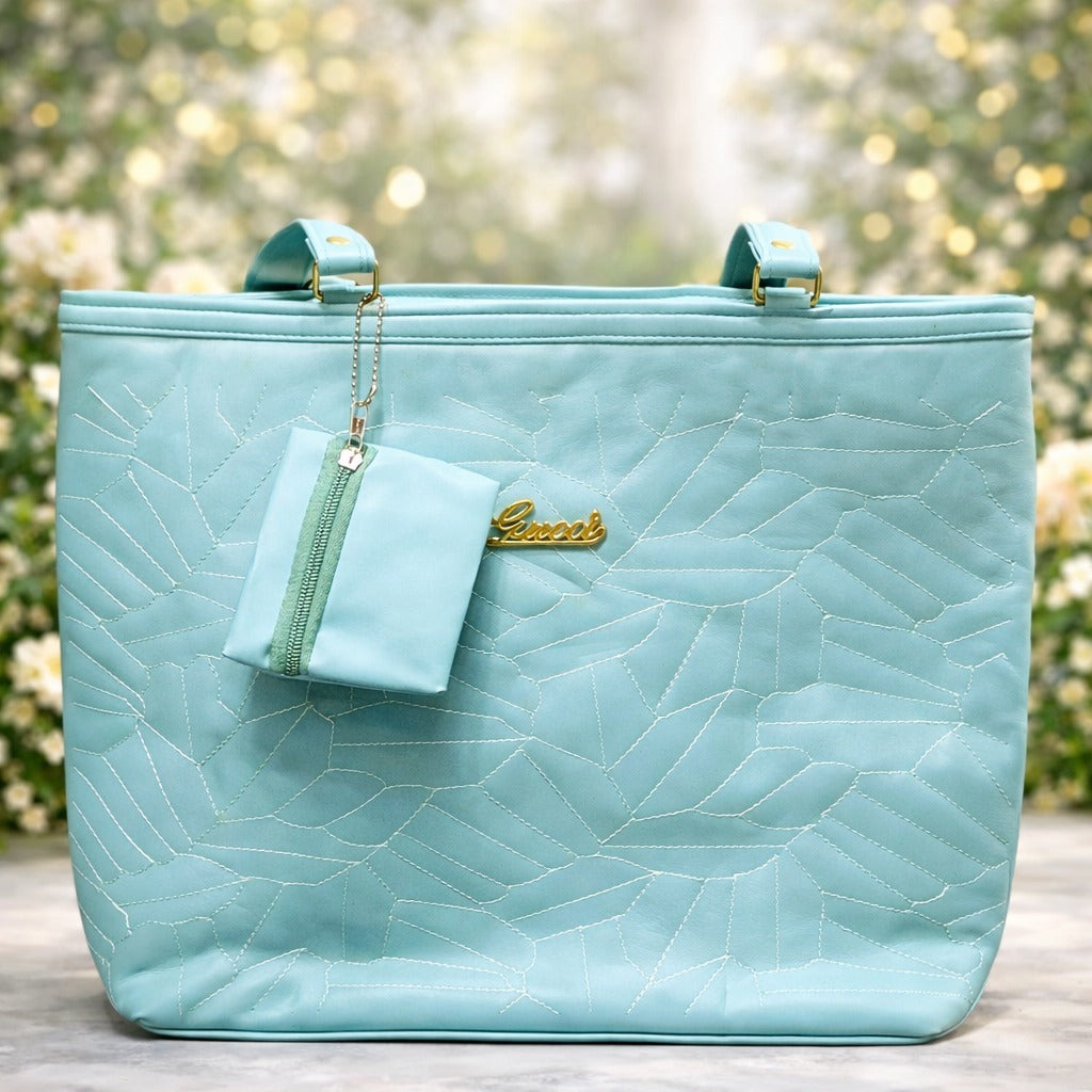 Light blue quilted handbag with a matching pouch | WearCareHub