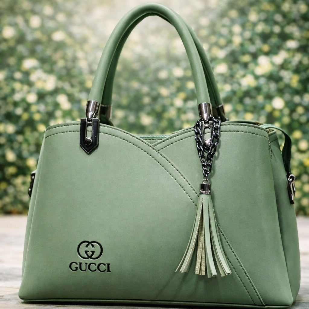Green Gucci handbag with tassel | WearCareHub