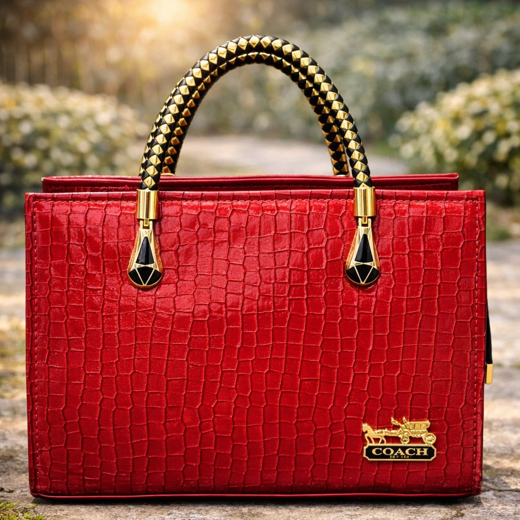 Red textured handbag with gold accents | WearCareHub