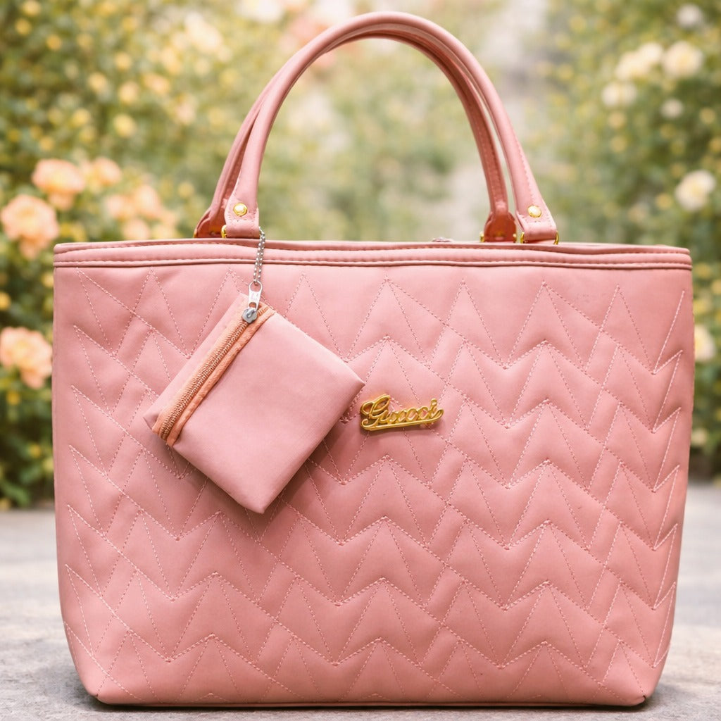 Pink quilted handbag with matching pouch | WearCareHub