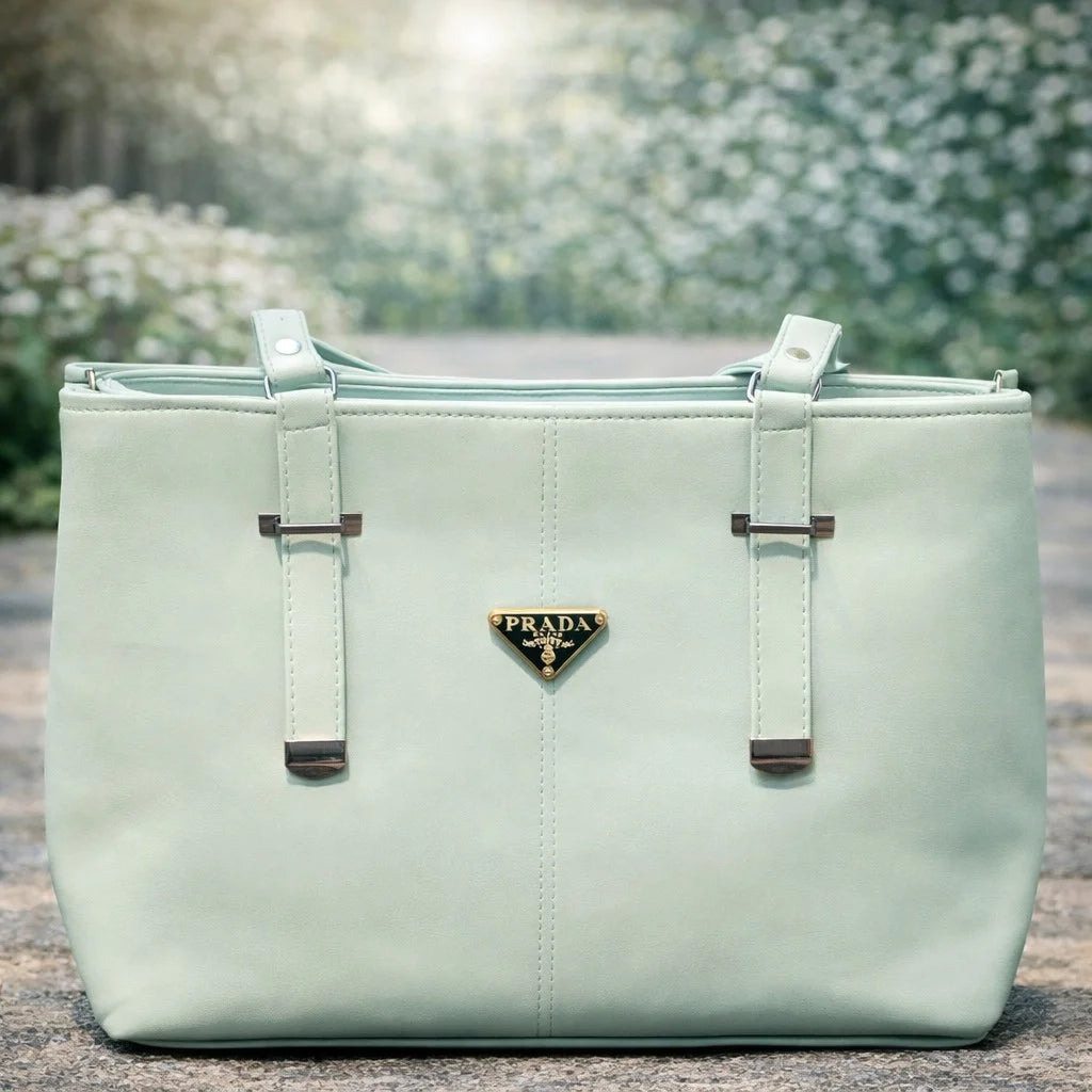 Mint green Prada handbag | WearCareHub