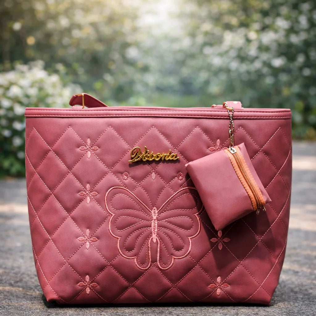Quilted pink handbag with butterfly design | WearCareHub